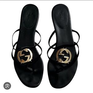 Gucci Black Slides with Gold Emblem